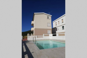 Trilocale vista mare con piscina a Badesi